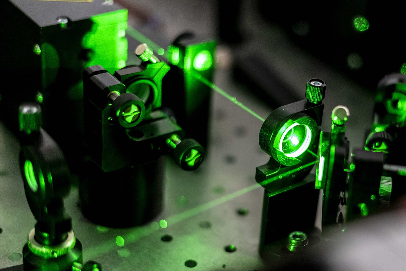 Green laser beams in a futuristic device