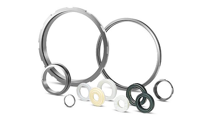 Sealing components for industrial pumps on white background