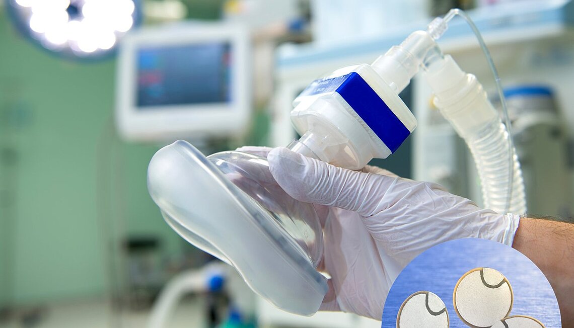 Hand holding a Respirator