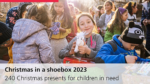 Girl in Romania is happy about Christmas present