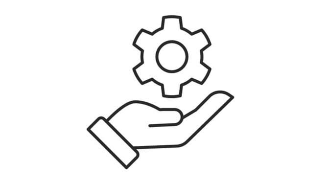 Graphic: Hand holding gear wheel