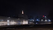 A Christmas tree lights up the night sky at CeramTec's new building in Marktredwitz